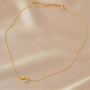 Gold knot necklace